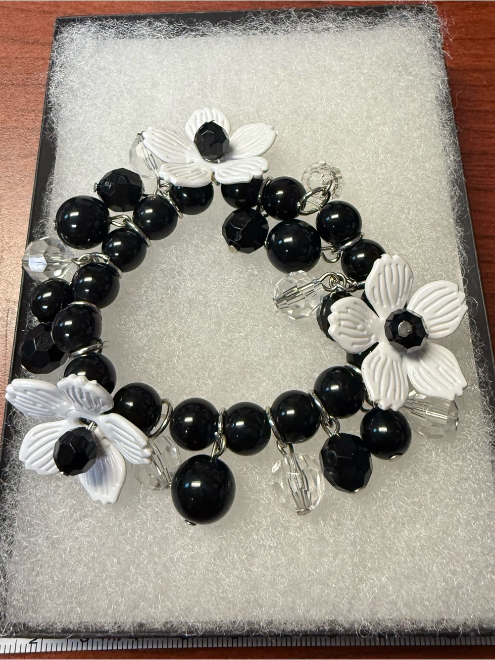 Black & White Beaded Bracelet Featuring White Flower Beads